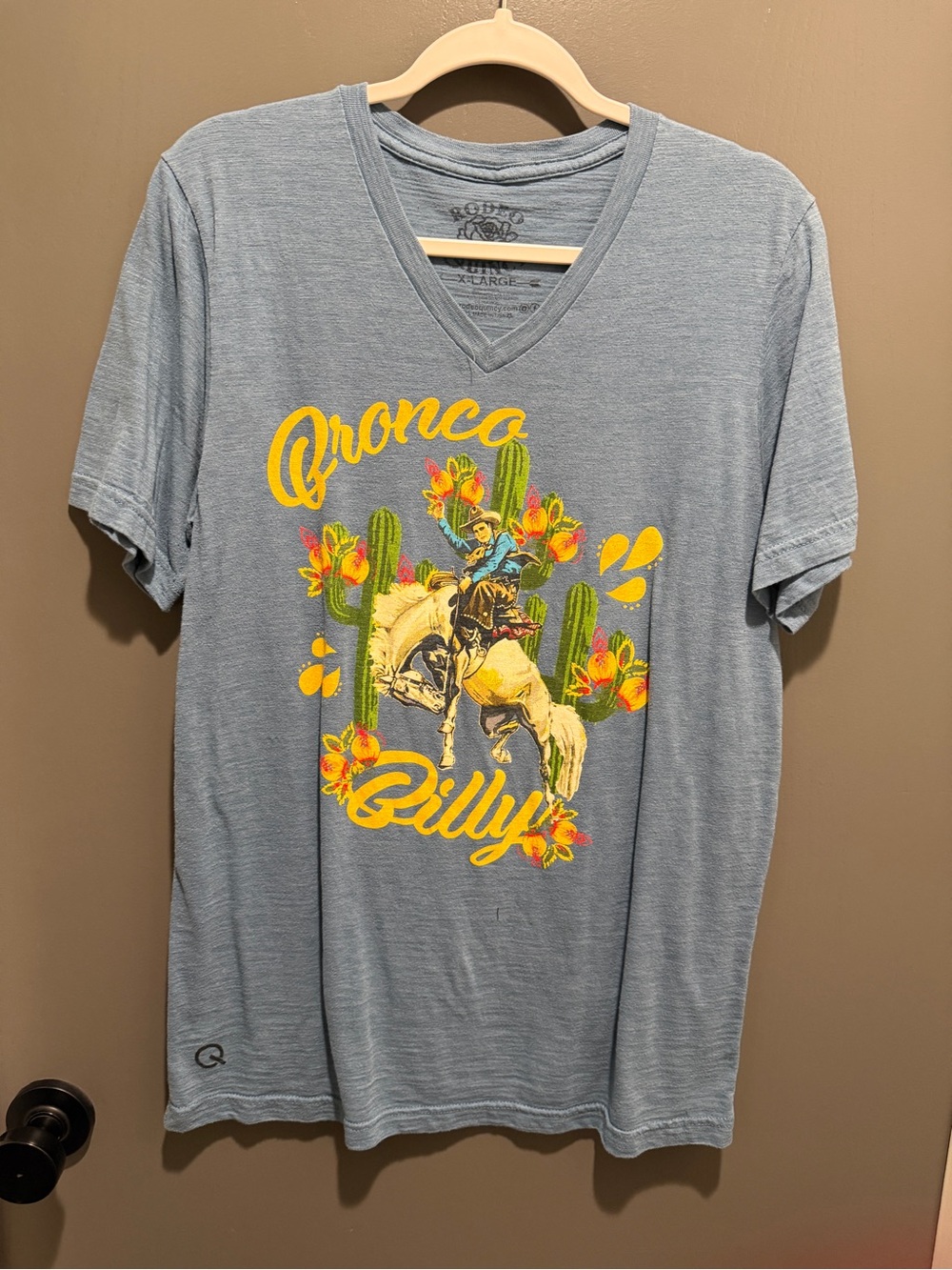 Bronco Billy Graphic V-Neck Tee in Heather Blue
